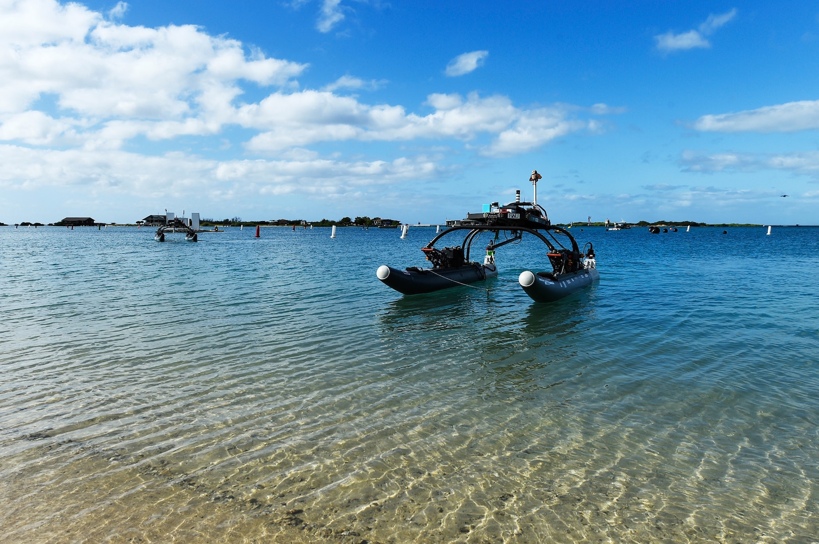 Owltonomous, autonomous surface vehicle from Florida Atlantic University, competes during Office of Naval Research–sponsored Maritime RobotX Challenge, Honolulu, Hawaii, December 14, 2018 (U.S. Navy/John F. Williams)