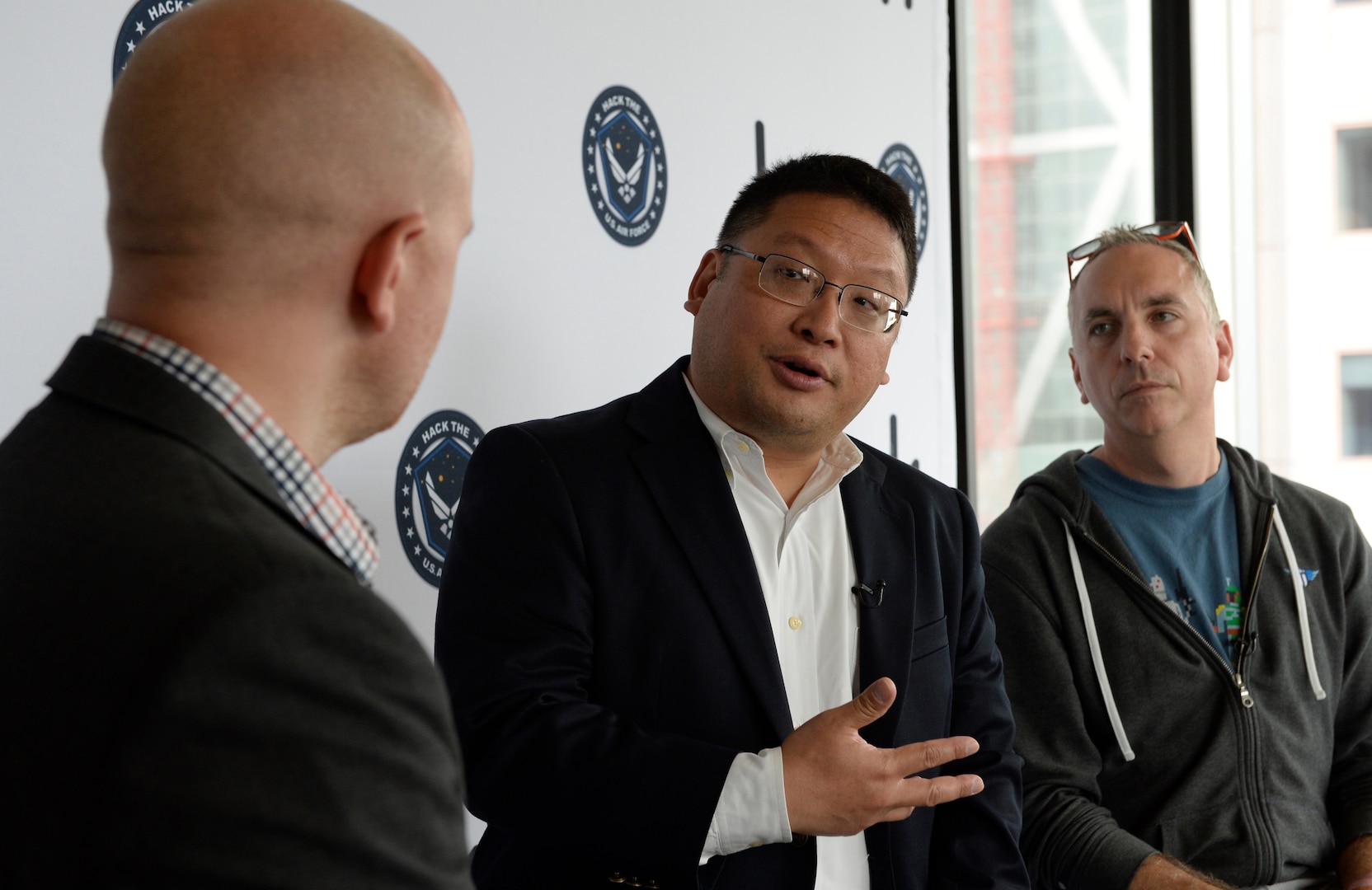 (From left) Alex Rice, chief technology officer and co-founder of HackerOne, Peter Kim, Air Force chief information security officer, and Chris Lynch, director of Defense Digital Service, announce “Hack the Air Force” event at HackerOne headquarters, San Francisco, April 26, 2017 (U.S. Air Force/Dan DeCook)
