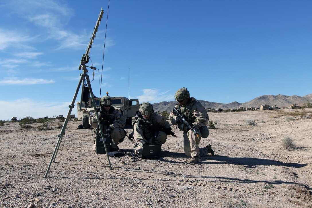 Cyberspace operations specialists with Expeditionary Cyber Support Detachment, 782nd Military Intelligence Battalion (Cyber), provide support to training rotation for 3rd Brigade Combat Team, 1st Cavalry Division, at National Training Center, Fort Irwin, California, January 13, 2019 (Steven Stover)