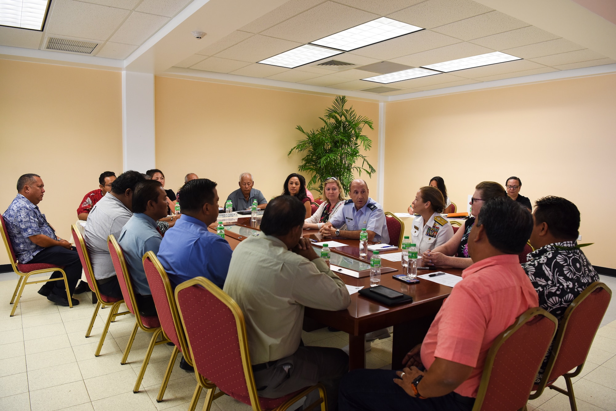 Officials from the Department of Defense, Commonwealth Port Authority, and the government of the Commonwealth of the Northern Mariana Islands hold a meeting before signing the Tinian divert airfield lease agreement May 3, 2019, at Tinian Airport, CNMI. The $21.9 million lease deal is intended to allow the U.S. Air Force to divert aircraft to Tinian for training and operations, while also spurring economic growth on the island of Tinian. (U.S. Air Force photo by Tech. Sgt. Jake Barreiro)