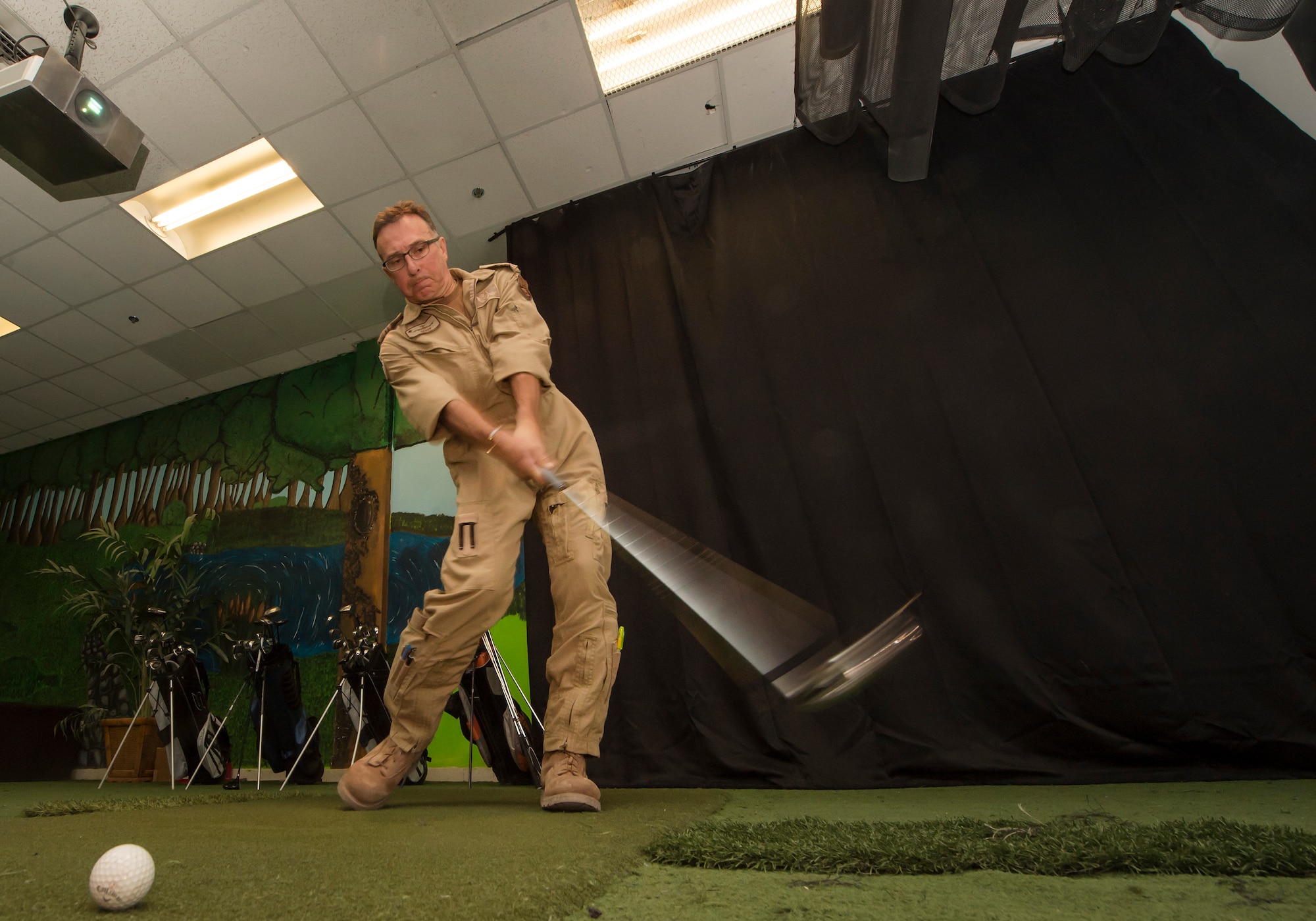 Being deployed thousands of miles from home can be challenging, but some service members take time to increase the quality of life for service members here.

When Royal Canadian Air Force Maj. Cameron ‘Divot’ Lowdown, 609th Air Operations Center senior offensive duty officer, visited the installation’s golf simulator, he saw more than a chance to practice his swing … he saw an opportunity to give back.
