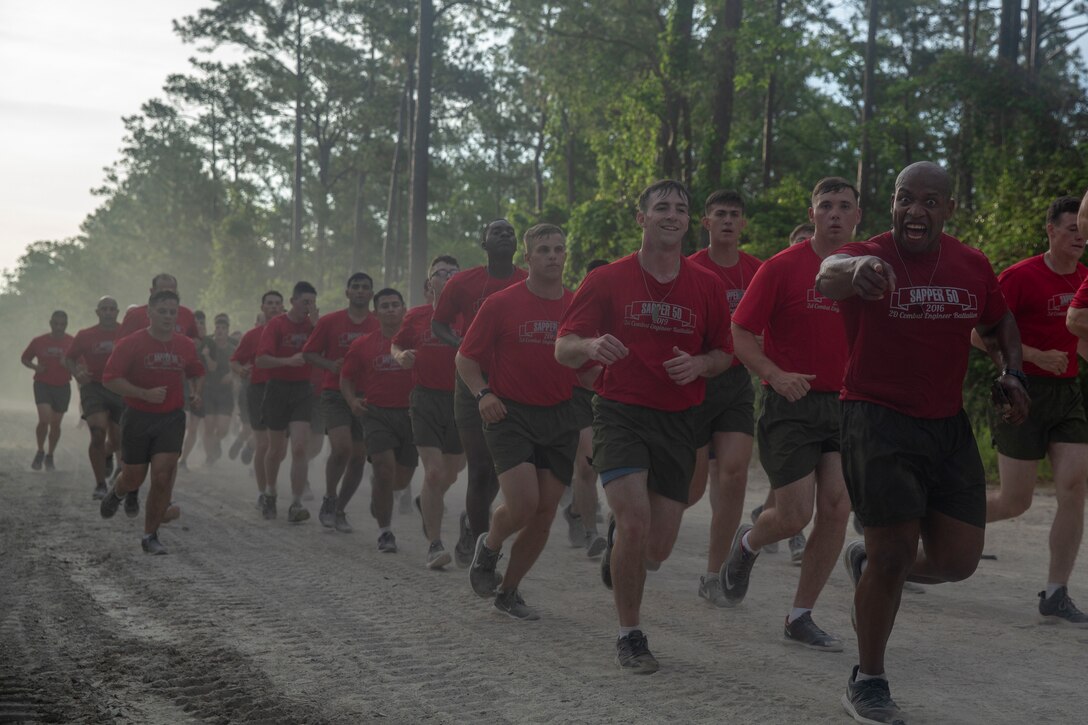 U.S. Marines with 2nd Combat Engineer Battalion, 2nd Marine Division, conduct the Sapper 50 on Camp Lejeune, N.C., May 3, 2019. The Sapper 50 is a memorial run in remembrance of the 29 combat engineers that gave their lives during Operation Enduring Freedom and Operation Iraqi Freedom. The dog tags are carried 5 miles by each group until every dog tag has traveled 50 miles. (U.S. Marine Corps photo by Lance Cpl. Tyler M. Solak)