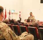 Staff Sgt. Damien Montgomery, 184th Sustainment Command, asks the audience a question about vehicle safety during nontactical vehicle training at Camp Arifjan, Kuwait, April 26, 2019. (U.S. Army National Guard photo by Sgt. Connie Jones) (Photo Credit: Sgt. Connie Jones)