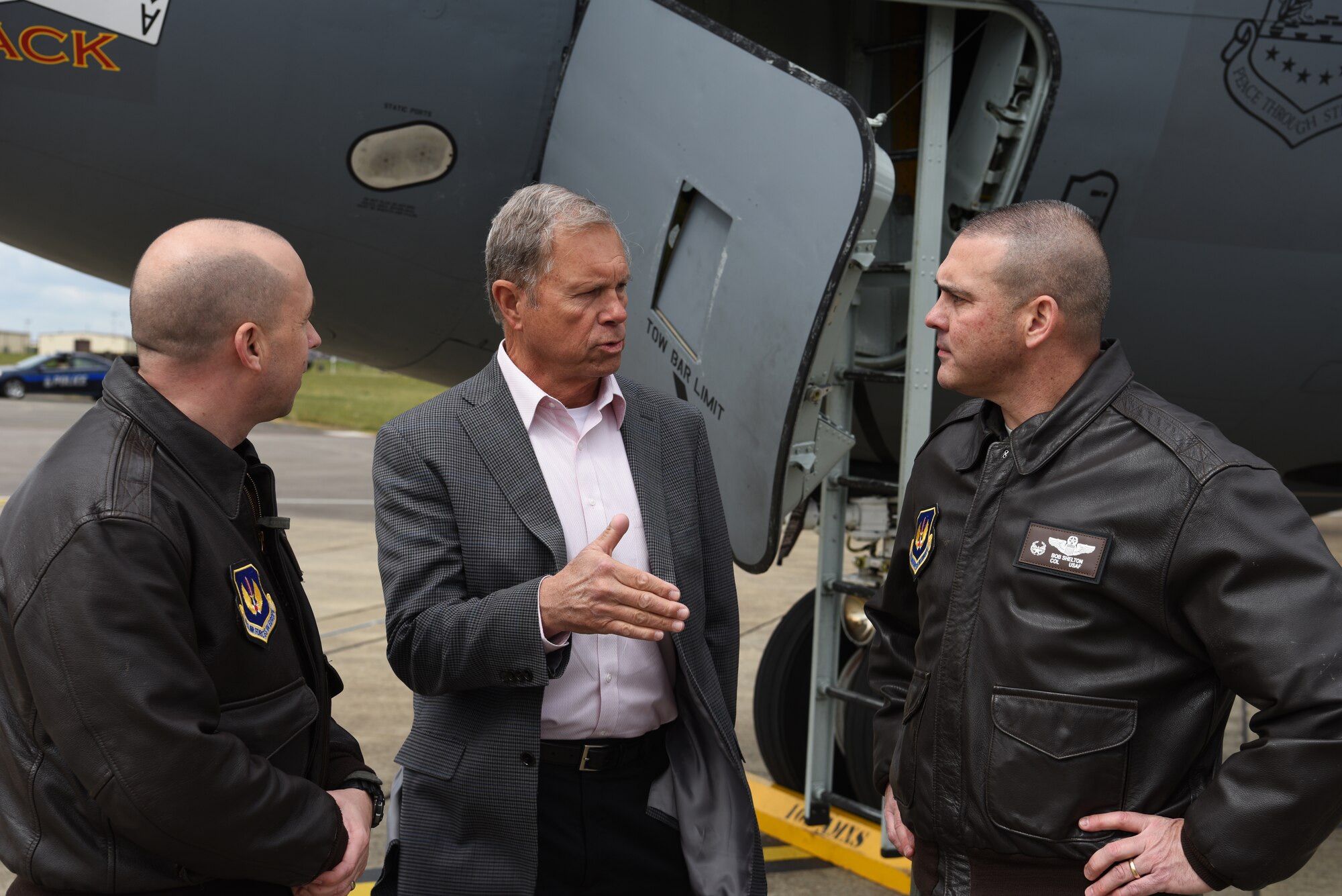 Retired U.S. Air Force Gen. William Fraser, former commander of U.S. Transportation Command and senior fellow for the National Defense University, center, speaks with Col. Cassius Bentley, 100th Air Refueling Wing vice commander, and Col. Bob Shelton, 100th Operations Group commander, at RAF Mildenhall, England, May 6, 2019. Members of the European Command Capstone 19-3 class visited Airmen of the 100th ARW, 352d Special Operations Wing and tenant units on base. (U.S. Air Force photo by Airman 1st Class Brandon Esau)