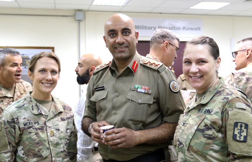 Hospital, Col. Nawaf Al-Dosari, M.D., director of the North Military Medical Complex, and Col. Kathleen Clary, 452d CSH, stand together at Camp Arifjan, Kuwait, May 5, 2019.