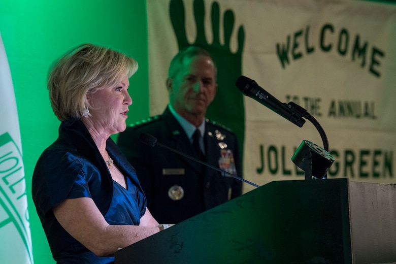 Dawn Goldfein thanks past and present members of the rescue community for their bravery as Air Force Chief of Staff Gen. David L. Goldfein listens, during the banquet celebrating the 50th reunion of the Jolly Green Association (JGA), May 4, 2019, in Fort Walton Beach, Fla. The JGA presented Airmen from the 41st Rescue Squadron (RQS) and the 48th RQS with the Rescue Mission of the Year award; the only non Air Force award recognized by the Air Force. Mrs. Goldfein spoke from her perspective as a spouse after Gen. Goldfein was shot down over Serbia on May 2, 1999. (U.S. Air Force Photo by Staff Sgt. Janiqua P. Robinson)