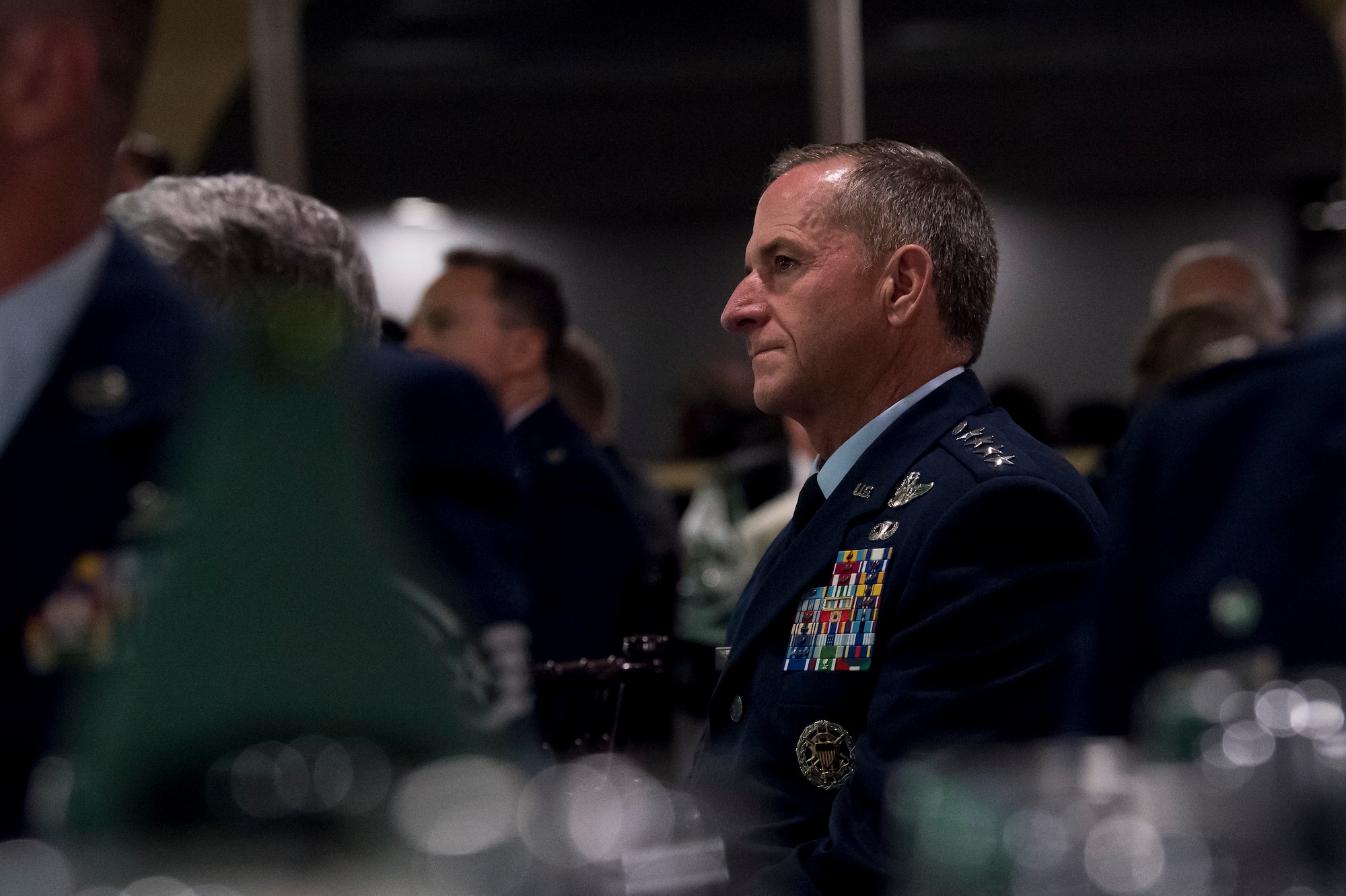 Air Force Chief of Staff Gen. David L. Goldfein listens to remarks during the banquet celebrating the 50th reunion of the Jolly Green Association (JGA), May 4, 2019, in Fort Walton Beach, Fla. The JGA presented Airmen from the 41st Rescue Squadron (RQS) and the 48th RQS with the Rescue Mission of the Year award; the only non Air Force rescue award recognized by the Air Force. (U.S. Air Force Photo by Staff Sgt. Janiqua P. Robinson)