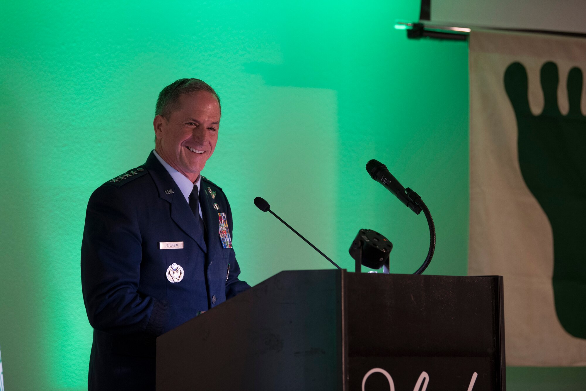 Air Force Chief of Staff Gen. David L. Goldfein speaks during the banquet celebrating the 50th reunion of the Jolly Green Association (JGA), May 4, 2019, in Fort Walton Beach, Fla. The JGA presented Airmen from the 41st Rescue Squadron (RQS) and the 48th RQS with the Rescue Mission of the Year award; the only non Air Force  rescue award recognized by the Air Force. Goldfein spoke about his own recovery after his F-16 Flying Falcon was shot down over Serbia on May 2, 1999. (U.S. Air Force Photo by Staff Sgt. Janiqua P. Robinson)