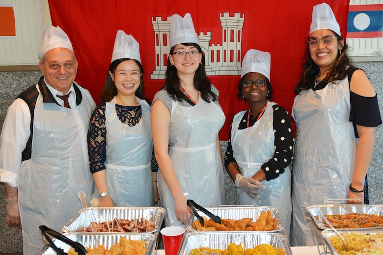 District personnel serve food at New York District’s Diversity Day.