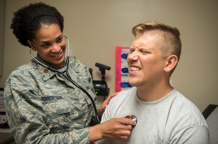 Maj. Erika Robertson, 628th Medical Operations Squadron family health nurse practitioner, listens to the heart of a simulated patient May 7, 2019, at Joint Base Charleston’s 628th Medical Group.