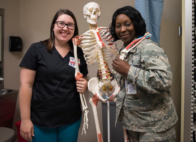Amber Garren, left, 628th Aerospace Medical Squadron flight medicine nurse, stands with Capt. Tomeka Jones, 628th Aerospace Medical Squadron Flight Medicine nurse, May 7, 2019, at Joint Base Charleston’s 628th Medical Group.