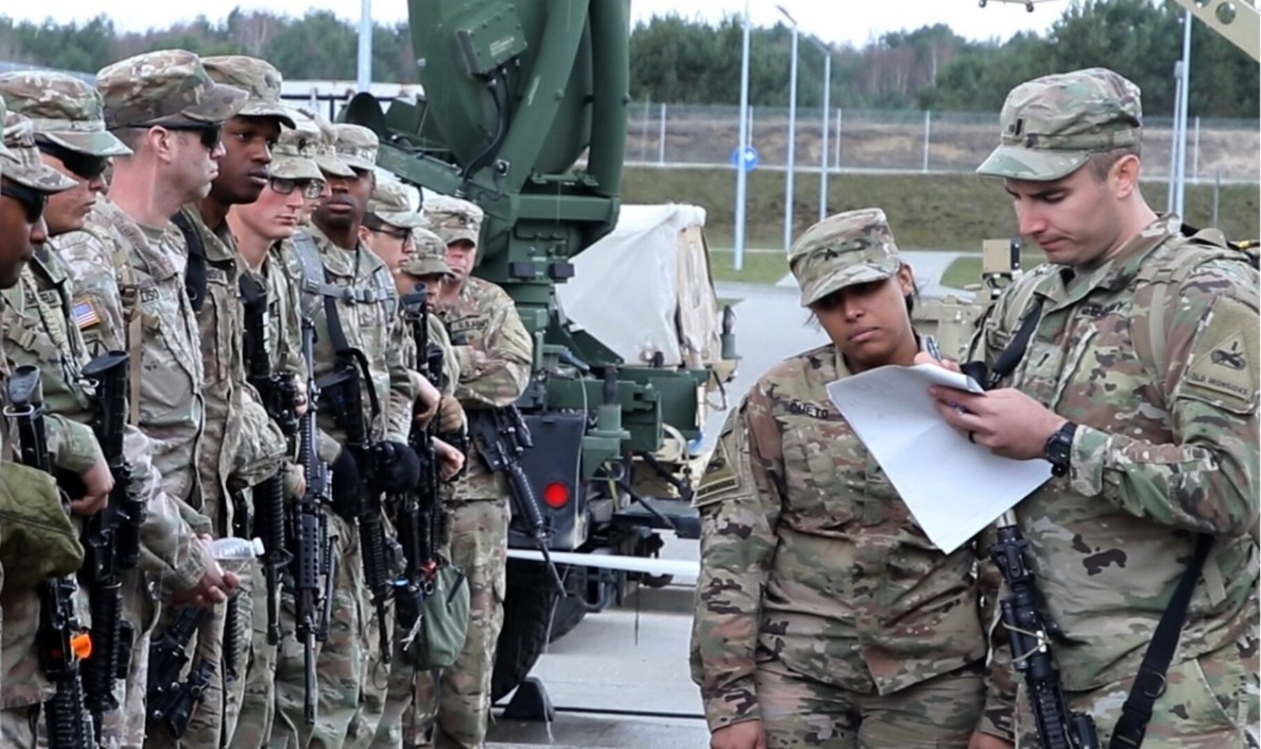 Soldiers with 1st Armored Division's 2nd Armored Brigade Combat Team from Fort Bliss, Texas, check in for roll call after arriving to Drawsko Pomorskie Training Area, Poland, March 19, 2019. The brigade recently conducted a no-notice deployment to Eastern Europe in an effort to test and ensure the rapid capabilities of units deploying to that region.