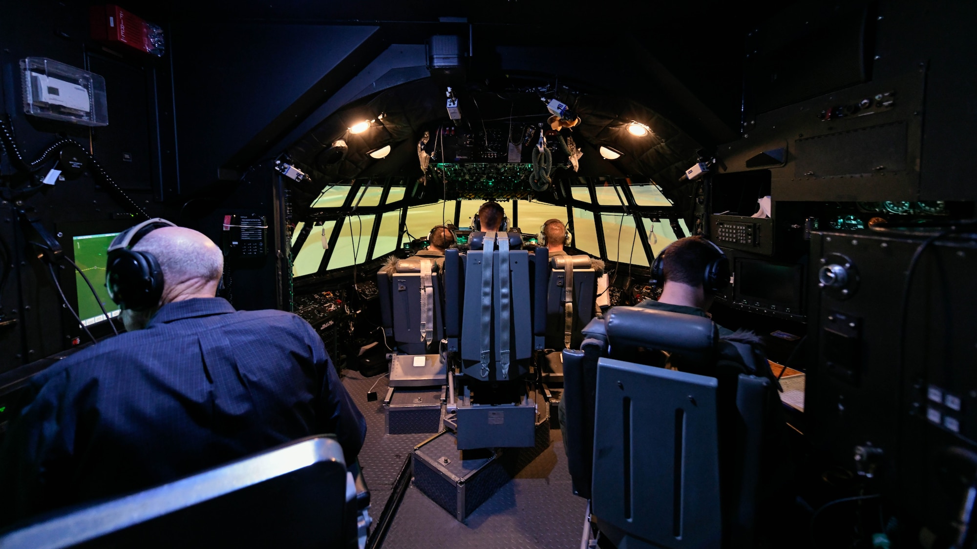 A 757th Airlift Squadron flight-crew operates a C-130H Hercules flight simulator on April 24, 2019, at the Dobbins Eastern Regional Flight Simulator at Dobbins Air Reserve Base, Georgia.