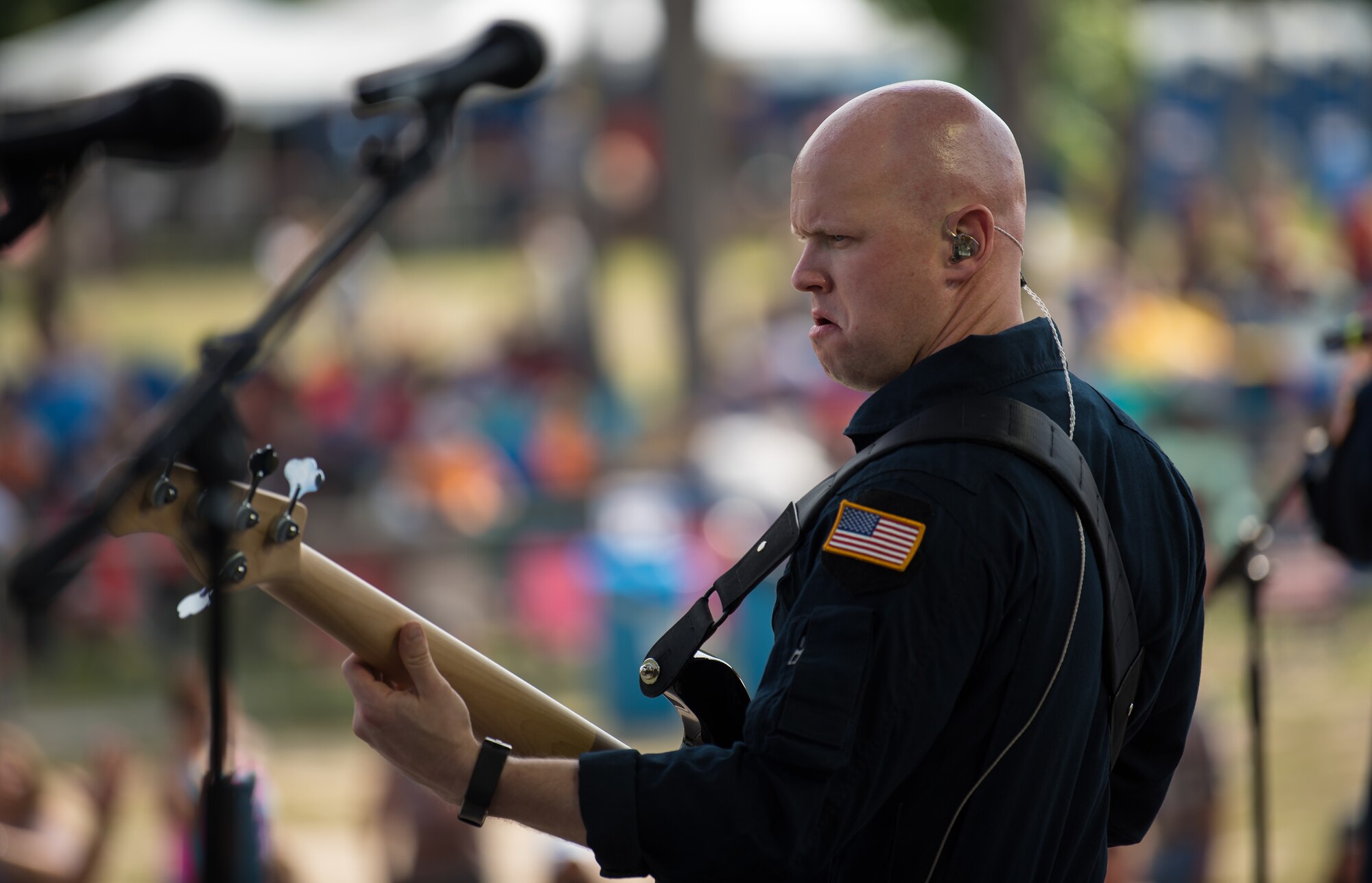 Technical Sgt. Mike Wittrien, bassist with Max Impact, performs at the Armed Forces Tribute for the 2019 Suwannee River Jam. This event took place at the Spirit of the Suwannee Music Park on Saturday, May 4, 2019. (U.S. Air Force Photo by Chief Master Sgt. Kevin Burns)