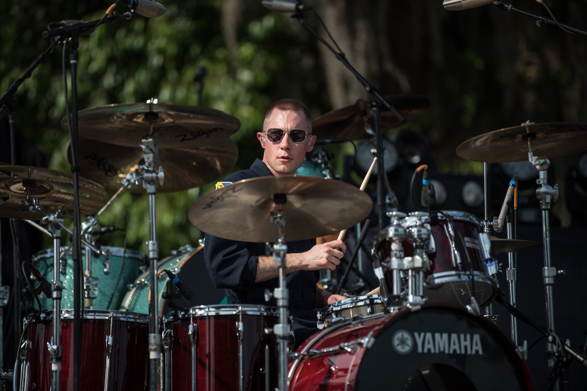 Technical Sgt. Gabriel Staznik, drummer with Max Impact, performs at the Armed Forces Tribute for the 2019 Suwannee River Jam. This event took place at the Spirit of the Suwannee Music Park on Saturday, May 4, 2019. (U.S. Air Force Photo by Chief Master Sgt. Kevin Burns)