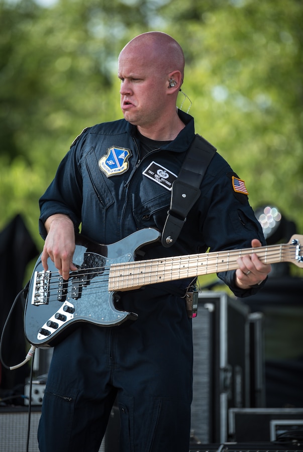 Technical Sgt. Mike Wittrien, bassist with Max Impact, performs for thousands of country music fans as part of the Armed Forces Tribute at the 2019 Suwannee River Jam. This event took place at the Spirit of the Suwannee Music Park on Saturday, May 4, 2019. (U.S. Air Force Photo by Chief Master Sgt. Kevin Burns)