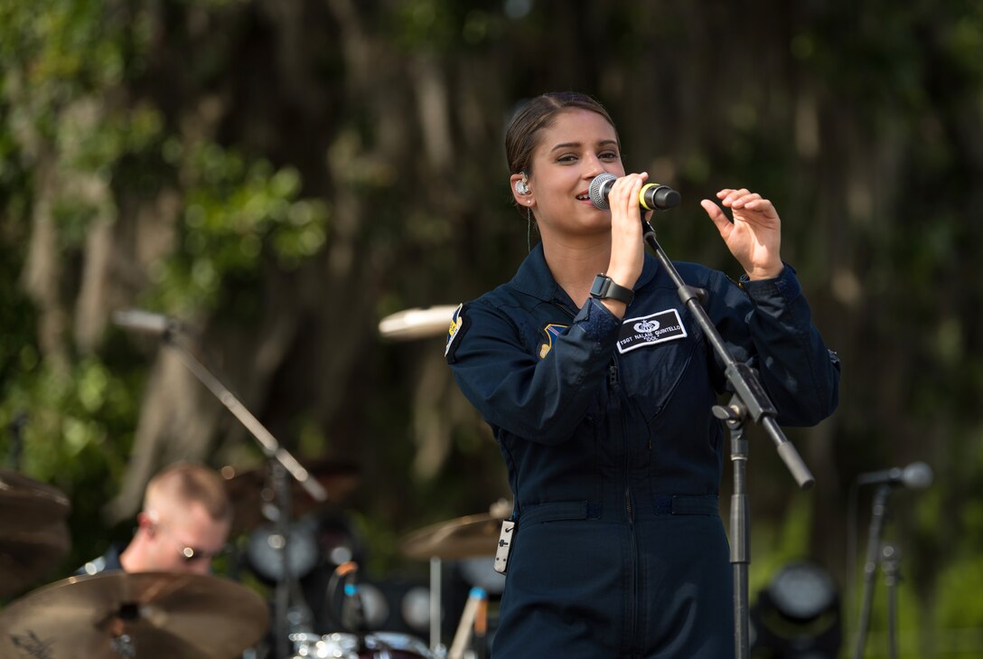 Lead vocalist for Max Impact, Technical Sgt. Nalani Quintello, performs at the Armed Forces Tribute during the 2019 Suwannee River Jam. This event took place at the Spirit of the Suwannee Music Park on Saturday, May 4, 2019. (U.S. Air Force Photo by Chief Master Sgt. Kevin Burns)