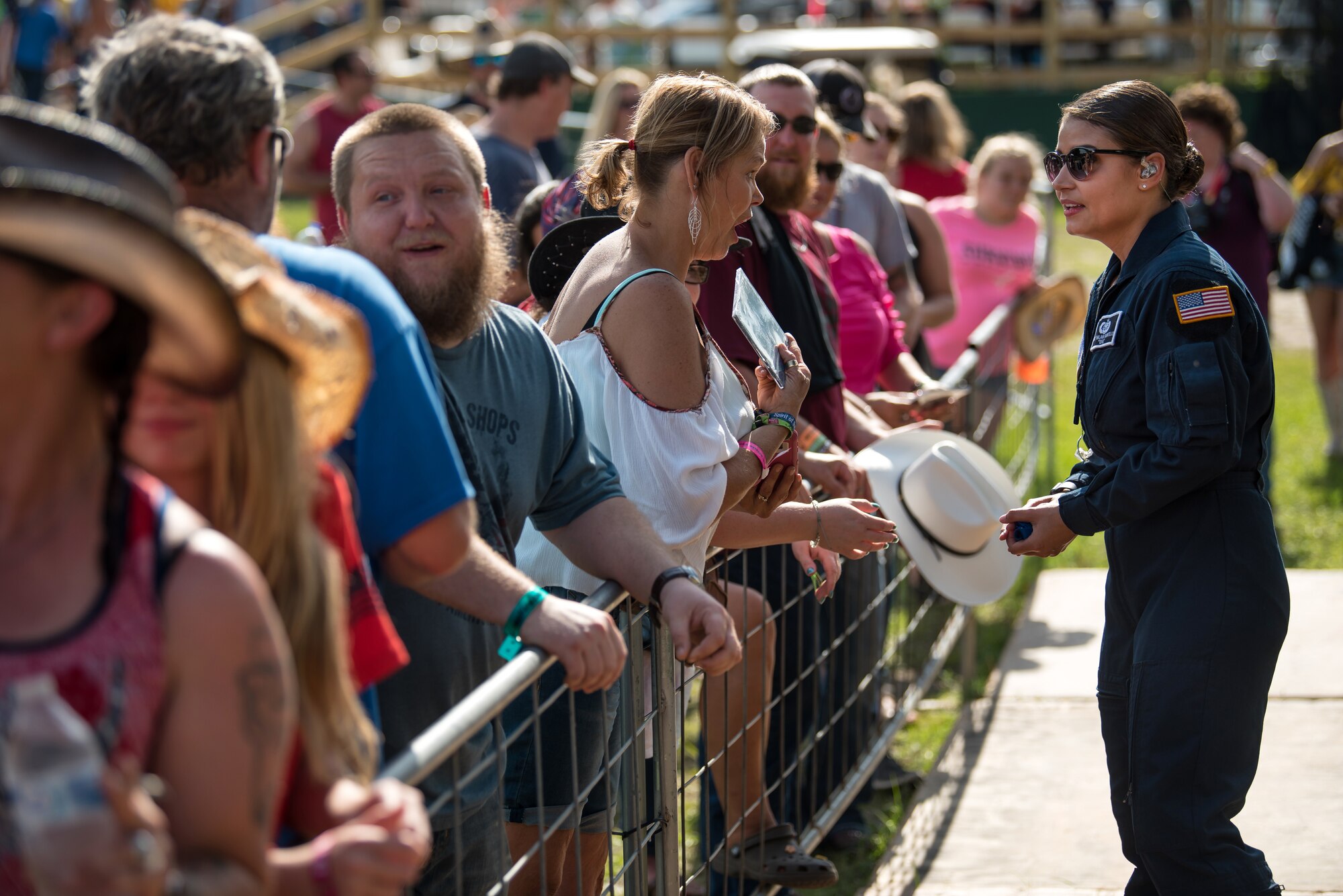 Lead vocalist for Max Impact, Technical Sgt. Nalani Quintello, visits with fans after performing for the Armed Forces Tribute at the 2019 Suwannee River Jam. This event took place at the Spirit of the Suwannee Music Park on Saturday, May 4, 2019.