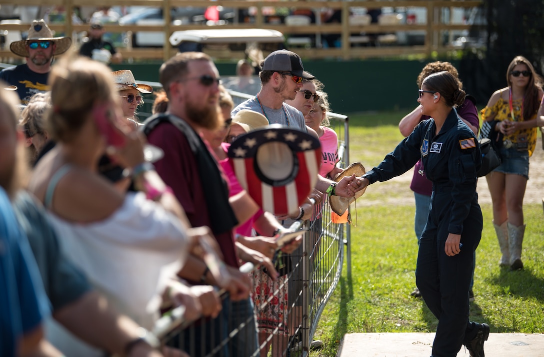 Lead vocalist of Max Impact, Technical Sgt. Nalani Quintello, visits with fans after performing for the Armed Forces Tribute at the 2019 Suwannee River Jam, which took place at the Spirit of the Suwannee Music Park on Saturday, May 4, 2019.