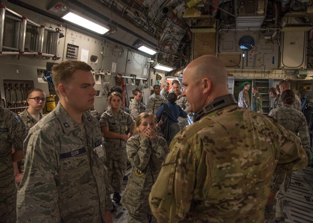 U.S. Air Force Maj. Andrew "Doug" Bisset, mission clinical coordinator with the 315th Aeromedical Evacuation Squadron at Joint Base Charleston, South Carolina, briefs Civil Air Patrol cadets on their roles as mock paitents before a National Disaster Management System exercise May 7, 2019, at JB Charleston. Approximately 30 CAP cadets volunteered as mock patients to assist in the NDMS training flight that helped the 315AES prepare for real life scenerios.