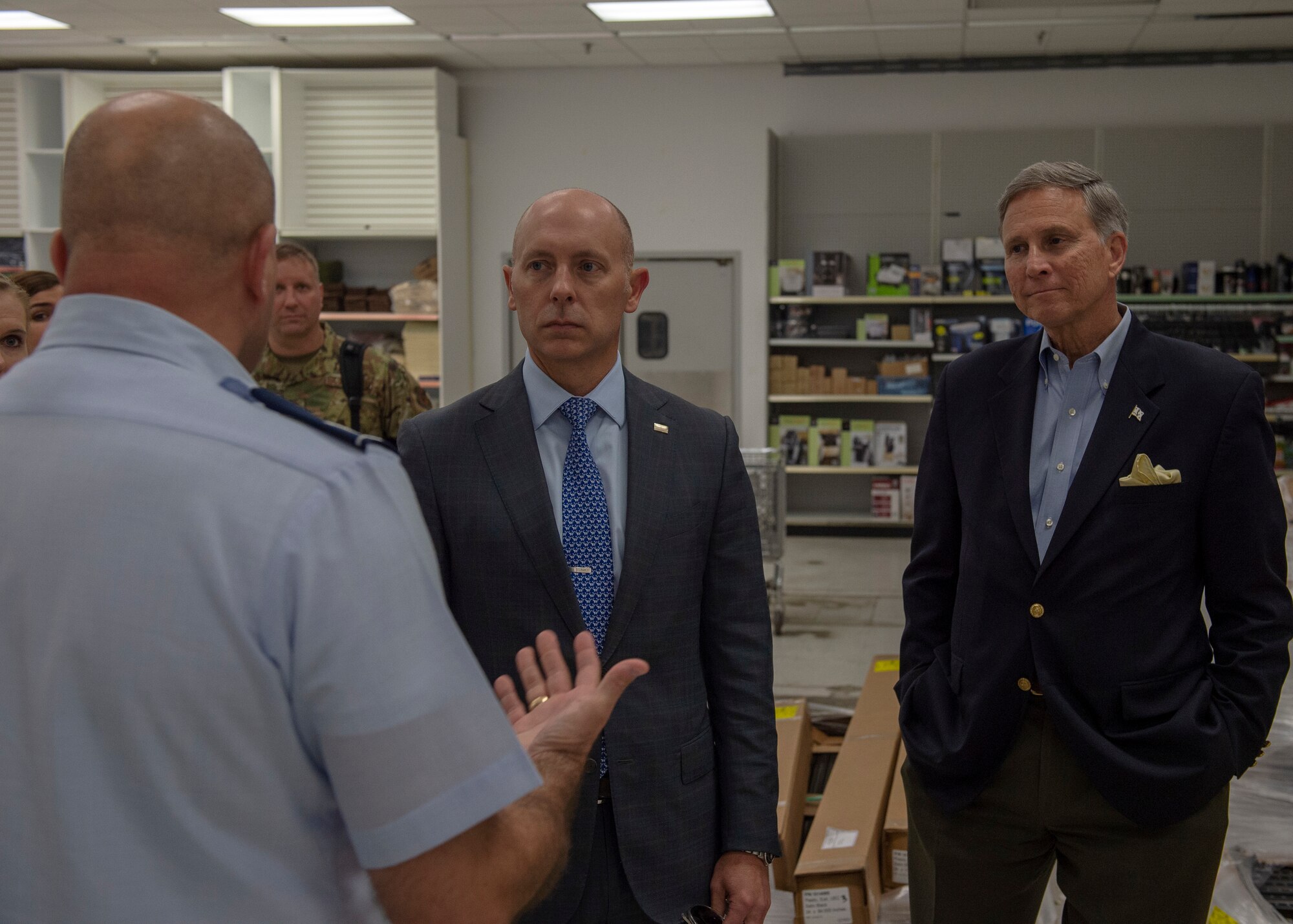 U.S. Air Force Col. Eric Carney, 97th Air Mobility Wing commander, briefs visitors from the Secretary of the Air Force and Navy Manpower/Reserve Affairs about the Base Exchange improvements coming to Altus Air Force Base, May 6, 2019, at Altus AFB, Okla. The visitors toured the wing and visited with leaders to discuss areas to improve upon. (U.S. Air Force Photo by Senior Airman Jackson N. Haddon)