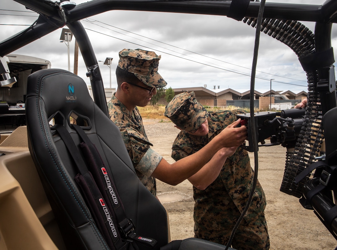 Marines with Marine Corps Air Station Miramar took interest in a display vehicle brought by Nikola Motor Company during the Installation Next event at the Bob Hope Theater on MCAS Miramar, Calif., May 7. The Installation Next event focused on the ability of the Marine Corps to meet the long-term challenges in official and personal movement of goods and people on our installations. (U.S. Marine Corps photo by Sgt. Becky Cleveland)