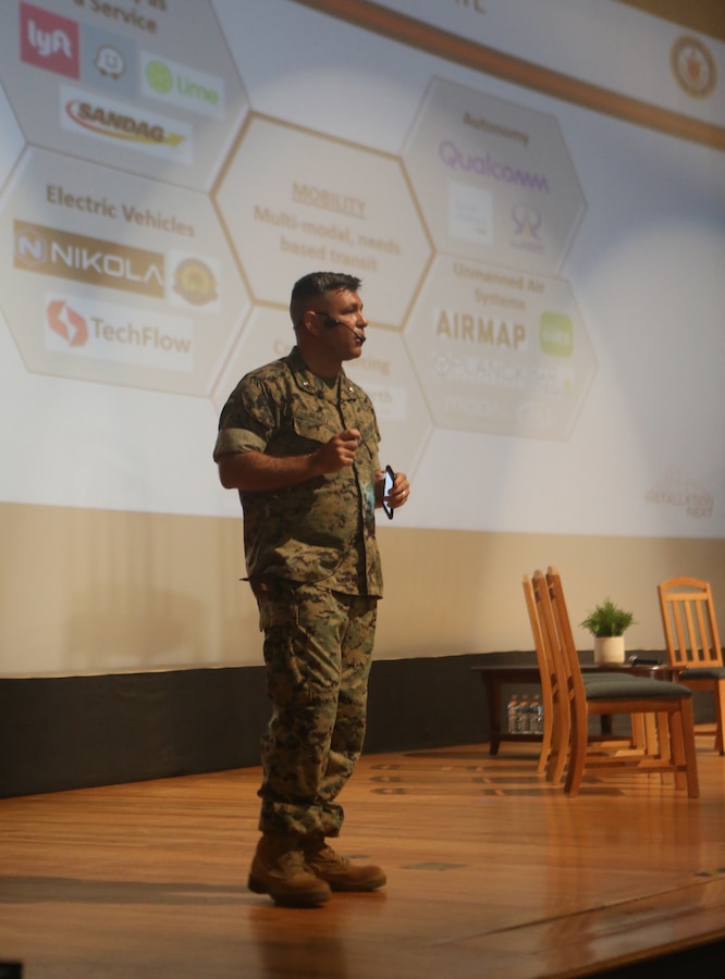 Lt. Col. Brandon Newell, the I-workX West lead with Marine Corps Installations Command, talks about the technological community during the Installation Next event at the Bob Hope Theater on Marine Corps Air Station Miramar, Calif., May 7. The Installation Next event focused on the ability of the Marine Corps to meet the long-term challenges in official and personal movement of goods and people on our installations. (U.S. Marine Corps photo by Lance Cpl. Jose GuerreroDeLeon)
