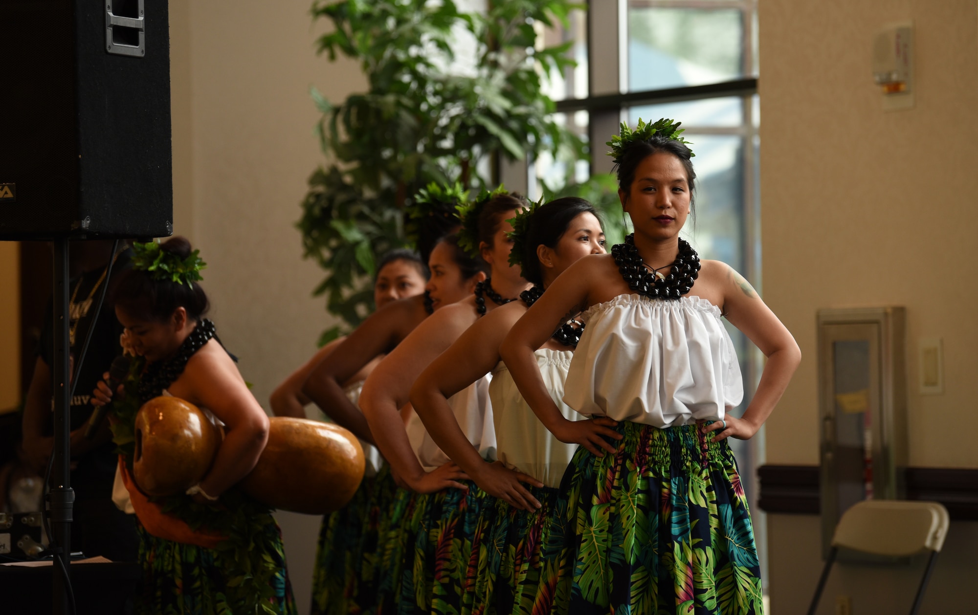 Members of the 808 Ohana of the Midwest dance group, led by Senior Airman Tiffany Ellison, 436th Supply Chain Operations Squadron, prepare to take the stage for a Hula performance on May 3, 2019, at Scott Air Force Base, Ill. The performance was a part of the Scott AFB Wingman Day Diversity Festival. (U.S. Air Force photo by Airman 1st Class Solomon Cook)