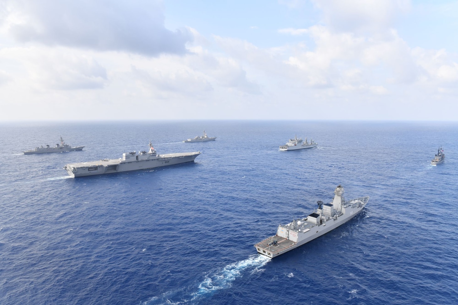 Navy guided-missile destroyer USS William P. Lawrence (DDG 110), transits through international waters with the Indian Navy destroyer INS Kolkata (D 63) and tanker INS Shakti (A 57), Japan Maritime Self-Defense Force helicopter-carrier JS Izumo (DDH 183) and destroyer JS Murasame (DD 101), and Republic of Philippine Navy patrol ship BRP Andres Bonifacio (PS 17) through the South China Sea.