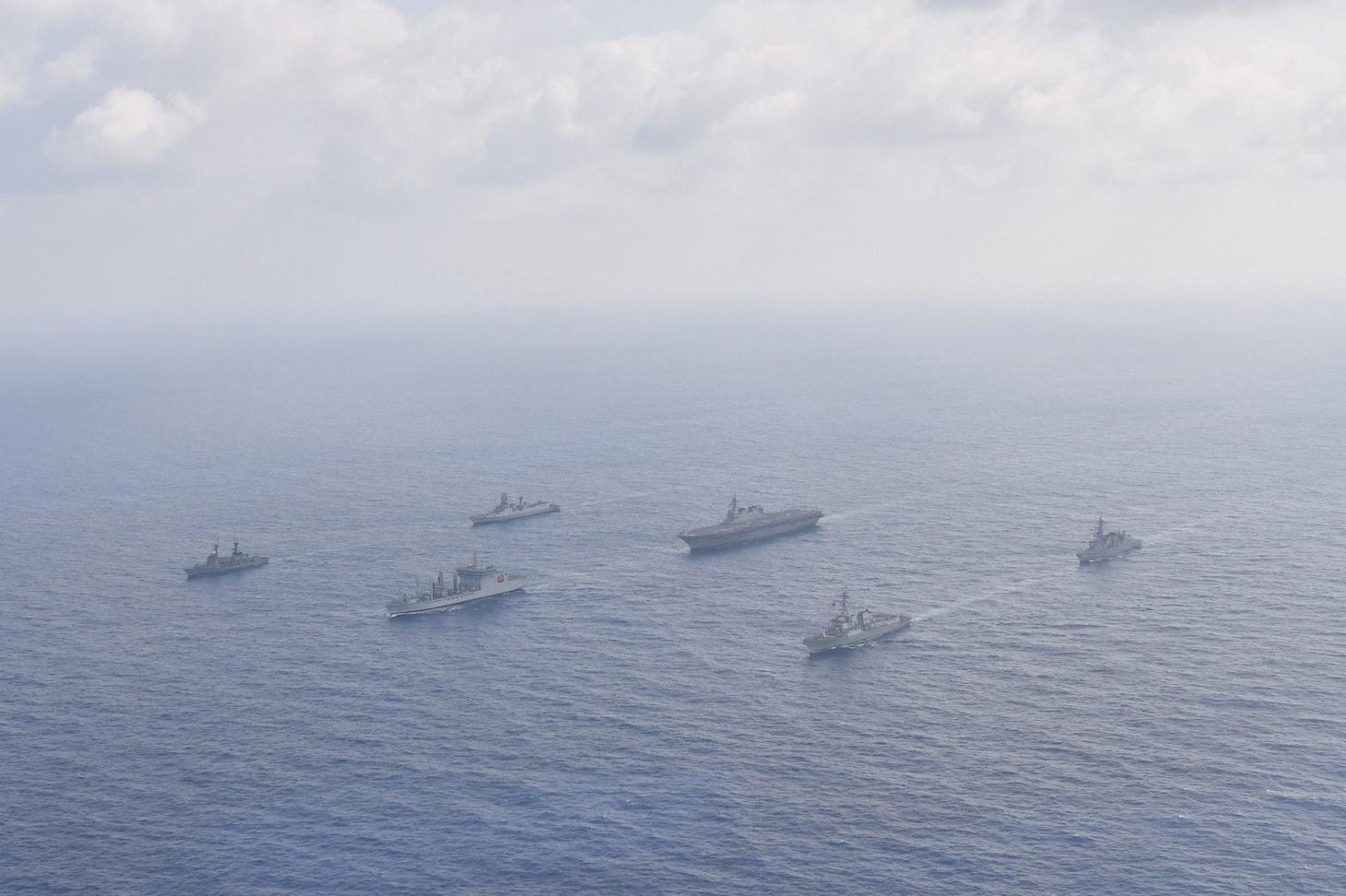 Navy guided-missile destroyer USS William P. Lawrence (DDG 110), transits through international waters with the Indian Navy destroyer INS Kolkata (D 63) and tanker INS Shakti (A 57), Japan Maritime Self-Defense Force helicopter-carrier JS Izumo (DDH 183) and destroyer JS Murasame (DD 101), and Republic of Philippine Navy patrol ship BRP Andres Bonifacio (PS 17) through the South China Sea.