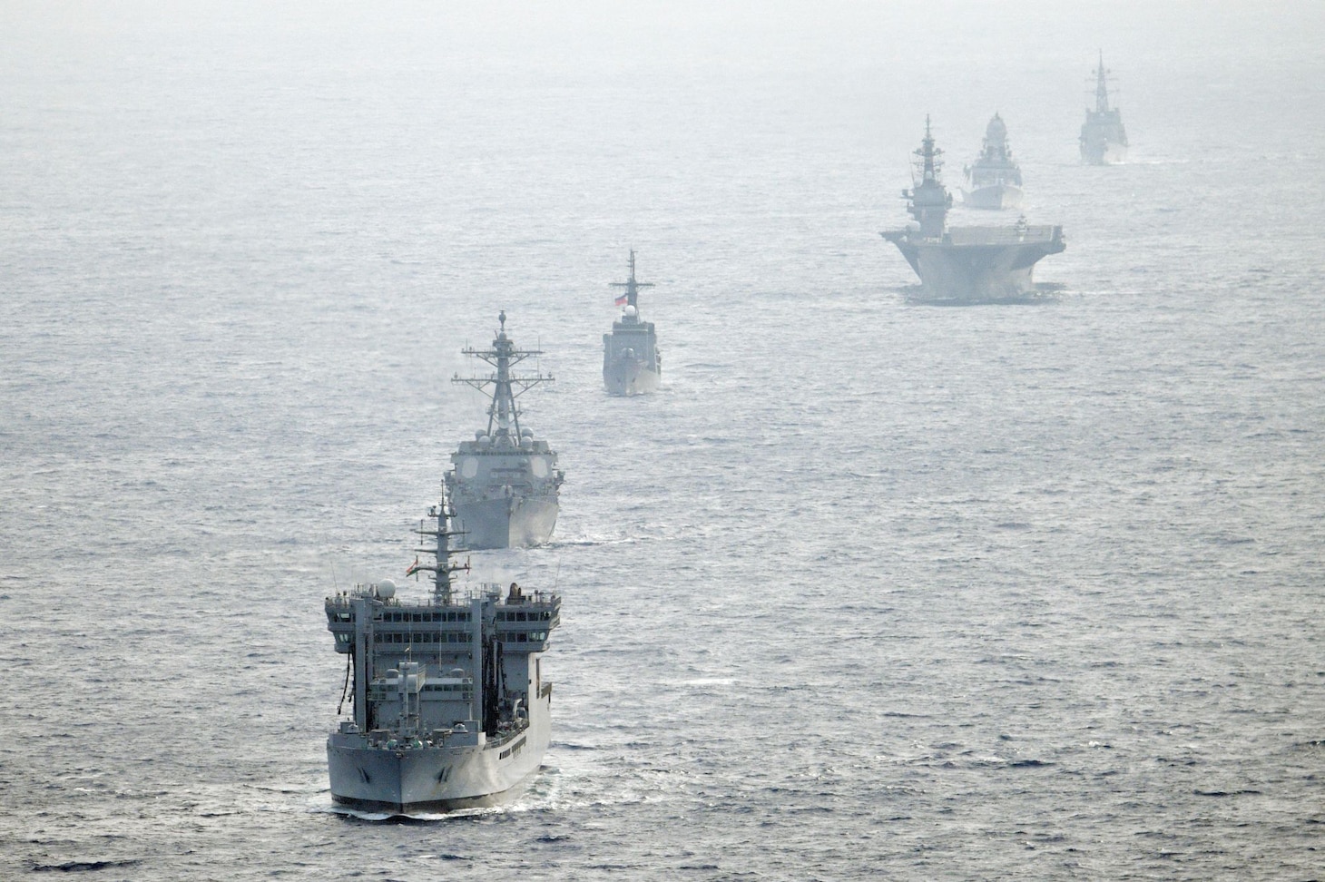 Navy guided-missile destroyer USS William P. Lawrence (DDG 110), transits through international waters with the Indian Navy destroyer INS Kolkata (D 63) and tanker INS Shakti (A 57), Japan Maritime Self-Defense Force helicopter-carrier JS Izumo (DDH 183) and destroyer JS Murasame (DD 101), and Republic of Philippine Navy patrol ship BRP Andres Bonifacio (PS 17) through the South China Sea.