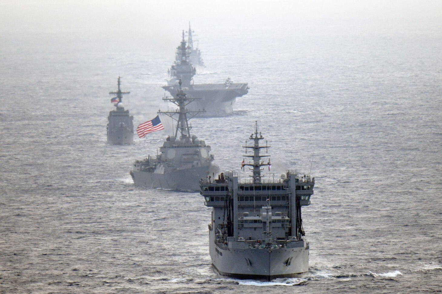Navy guided-missile destroyer USS William P. Lawrence (DDG 110), transits through international waters with the Indian Navy destroyer INS Kolkata (D 63) and tanker INS Shakti (A 57), Japan Maritime Self-Defense Force helicopter-carrier JS Izumo (DDH 183) and destroyer JS Murasame (DD 101), and Republic of Philippine Navy patrol ship BRP Andres Bonifacio (PS 17) through the South China Sea.
