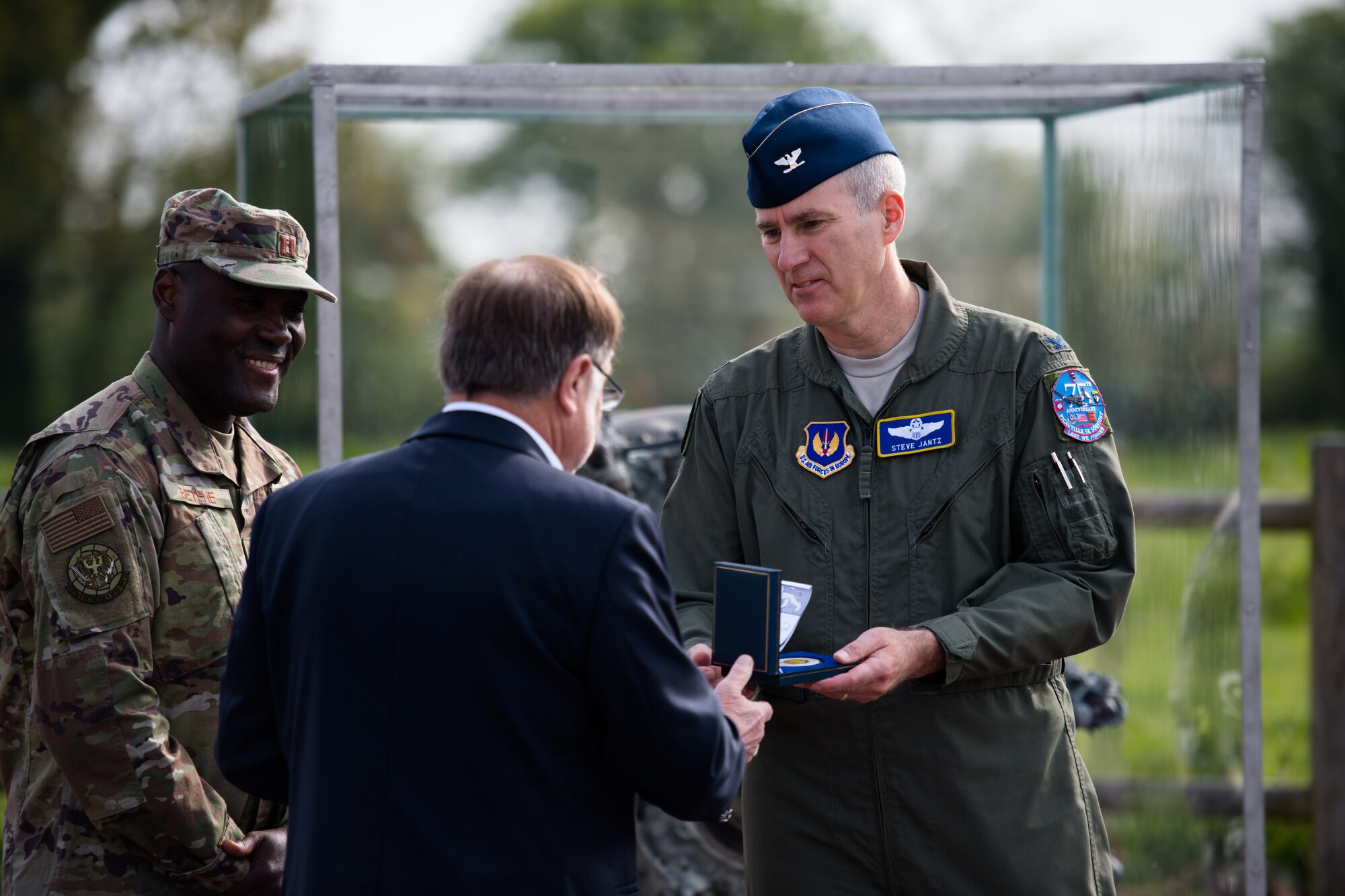 U.S. Air Force Col. Steven J. Jantz, 435th Air Ground Operations Wing and 435th Air Expeditionary Wing vice commander, accepts a medallion from Philippe Catherine, Mayor of Picauville, France, on behalf of the 435th AGOW at a WWII memorial in Picauville, May 1, 2019. Catherine presented the medallion as a way to say thank you to Jantz’ team for refurbishing the memorial. (U.S. Air Force photo by Staff Sgt. Devin Boyer)