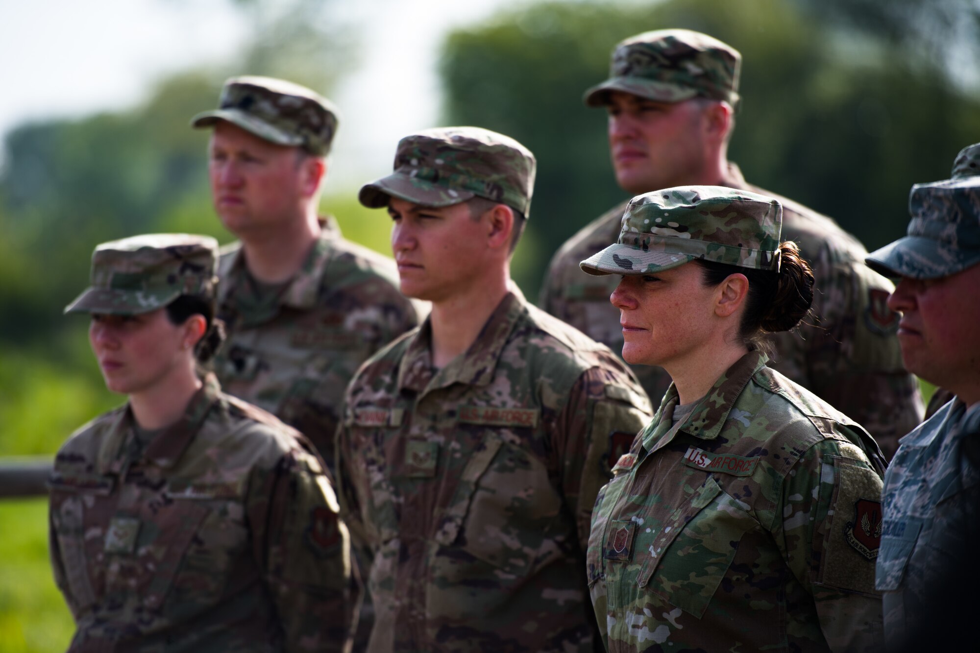 U.S. Air Force Airmen assigned to the 435th Construction Training Squadron, stand at parade rest during a ceremony at a WWII memorial in Picauville, France, May 1, 2019. The mayor of Picauville and the organization that oversees the memorial recognized and gave thanks to the Airmen who refurbished the memorial. (U.S. Air Force photo by Staff Sgt. Devin Boyer)