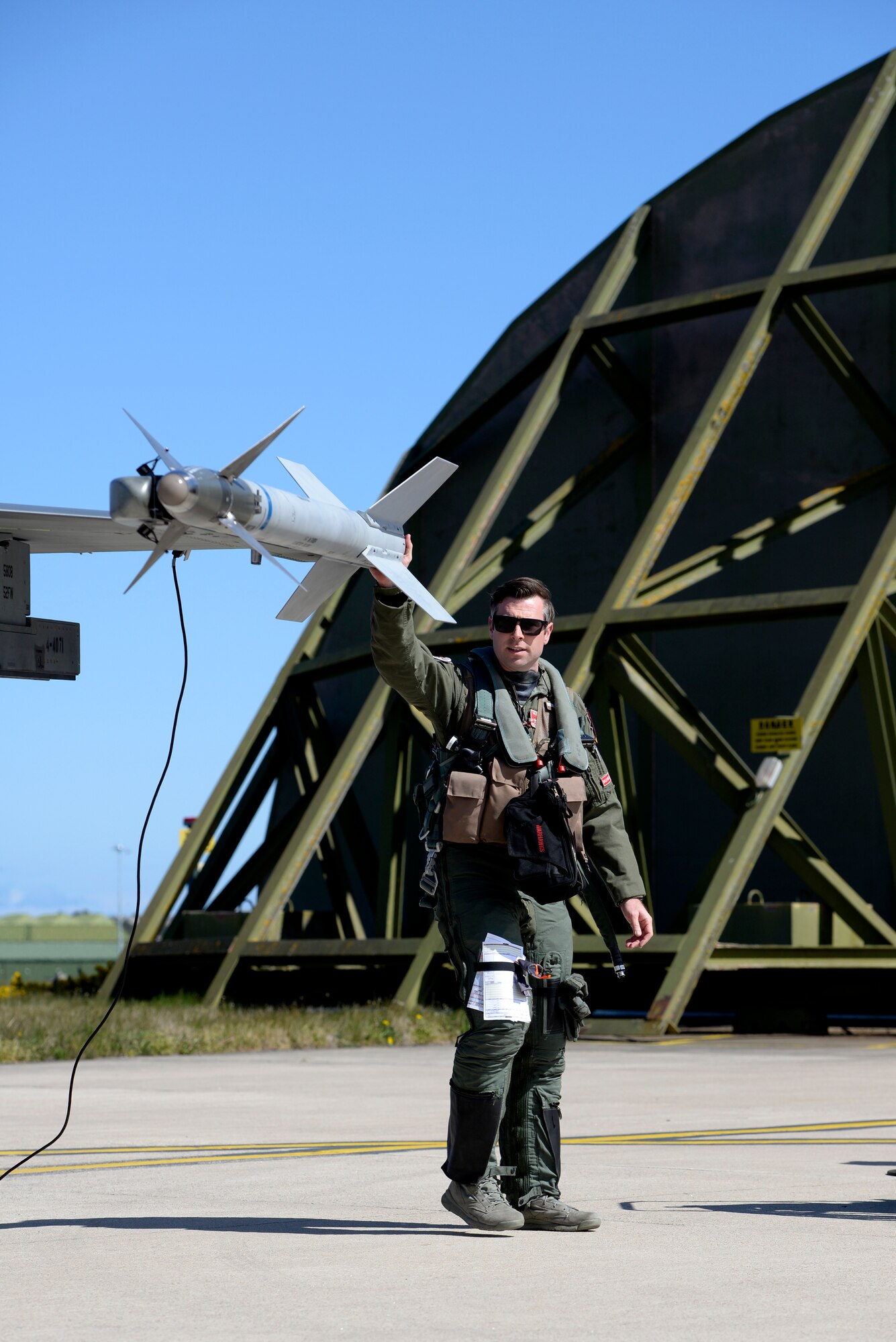 U.S. Air Force Maj. Kevin Bunten, 480th Fighter Squadron Assistant Director of Operations, conducts a pre-flight inspection of his F-16 Fighting Falcon before flying a low-level training sortie at RAF Lossiemouth, Scotland, May 7, 2019, during exercise Formidable Shield. Formidable Shield is a U.S.-led exercise, conducted by Naval Striking and Support Forces NATO. The purpose of the training is to improve allied interoperability in a live-fire integrated air and missile defense exercise. (U.S. Air Force photo by Master Sgt. Austin M. May)