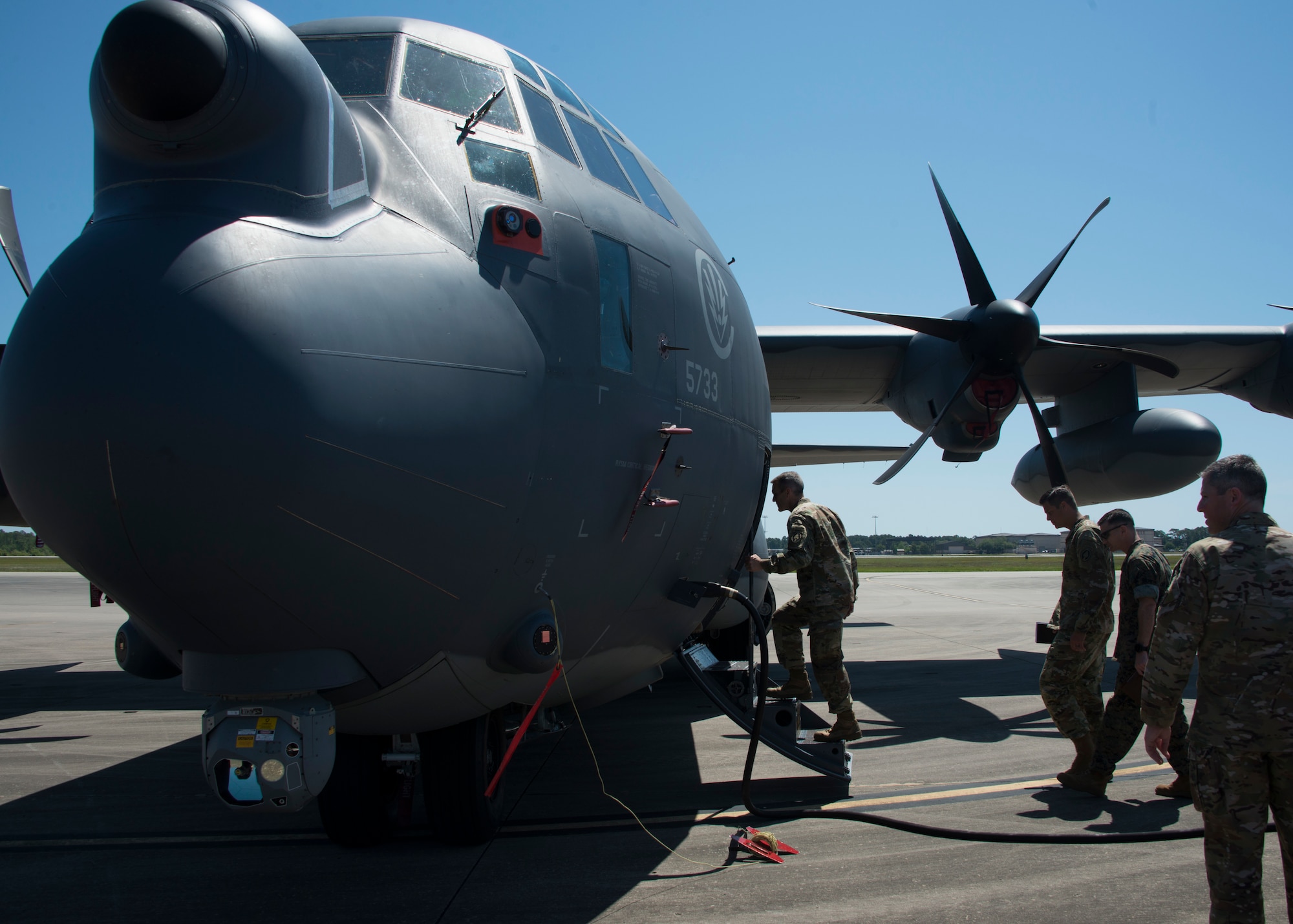 One person walking into an aircraft.