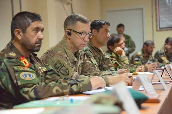 Brig. Gen. Scott Jackson, left center, commander of the 1st Security Force Assistance Brigade, attends an Afghan-led battle update briefing Sept. 18, 2018. Jackson and other advisors in his brigade often attend the briefings near his command headquarters at Advising Platform Lightning to offer their insight to counterparts. (Photo Credit: Sean Kimmons)
