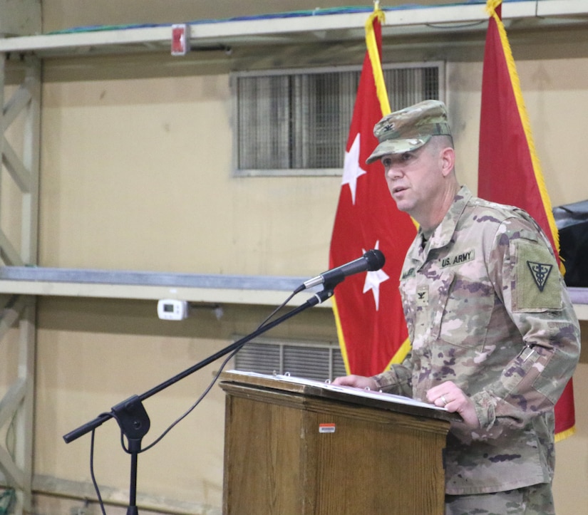 Col. Jeffrey McCarter, 8th Medical Brigade commander, speaks to the audience during the transfer of authority ceremony for United States Military Hospital - Kuwait at Camp Arifjan, Kuwait, May 6, 2019.