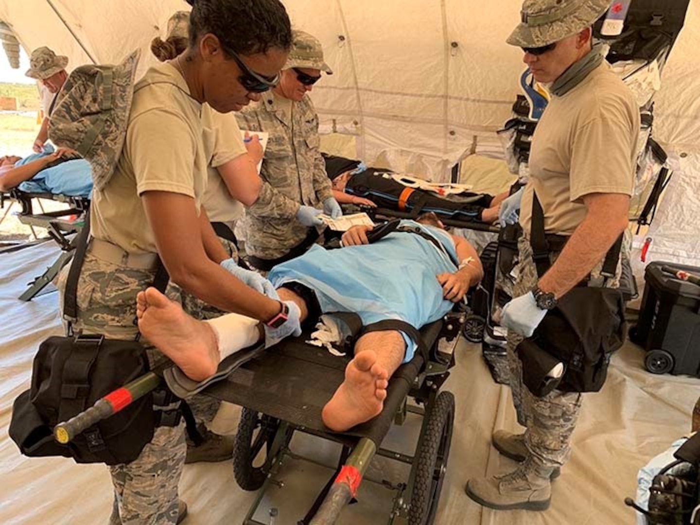 Airmen from the 156th Medical Group treat simulated mass casualties during Exercise Vigilant Guard in Puerto Rico, March 14, 2019. The 156th Airlift Wing transitioned to the 156th Wing April 10 to sync with the unit’s newly assigned contingency response and combat communications missions.