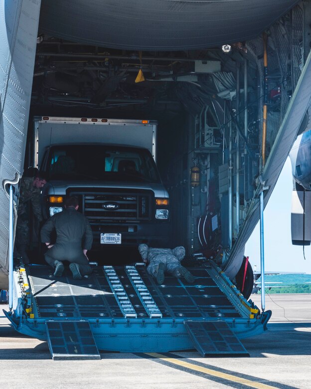 U.S. Air Force Reservists from the 96th Aerial Port Squadron and Air National Guardsmen from the 189th Airlift Wing, practice proper techniques for loading and unloading cargo and vehicles onto a C-130H at Little Rock Air Force Base, Ark. on May 5, 2019.