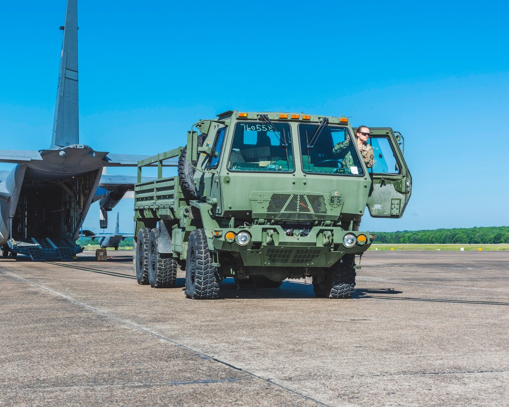 U.S. Air Force Reservist Master Sgt. Stacy Hunt, 96th Aerial Port Squadron air transportation specialist, enters the cab of a type of Family of Medium Tactical Vehicle to practice proper techniques for loading and unloading cargo and vehicles onto a C-130H at Little Rock Air Force Base, Ark. on May 5, 2019.