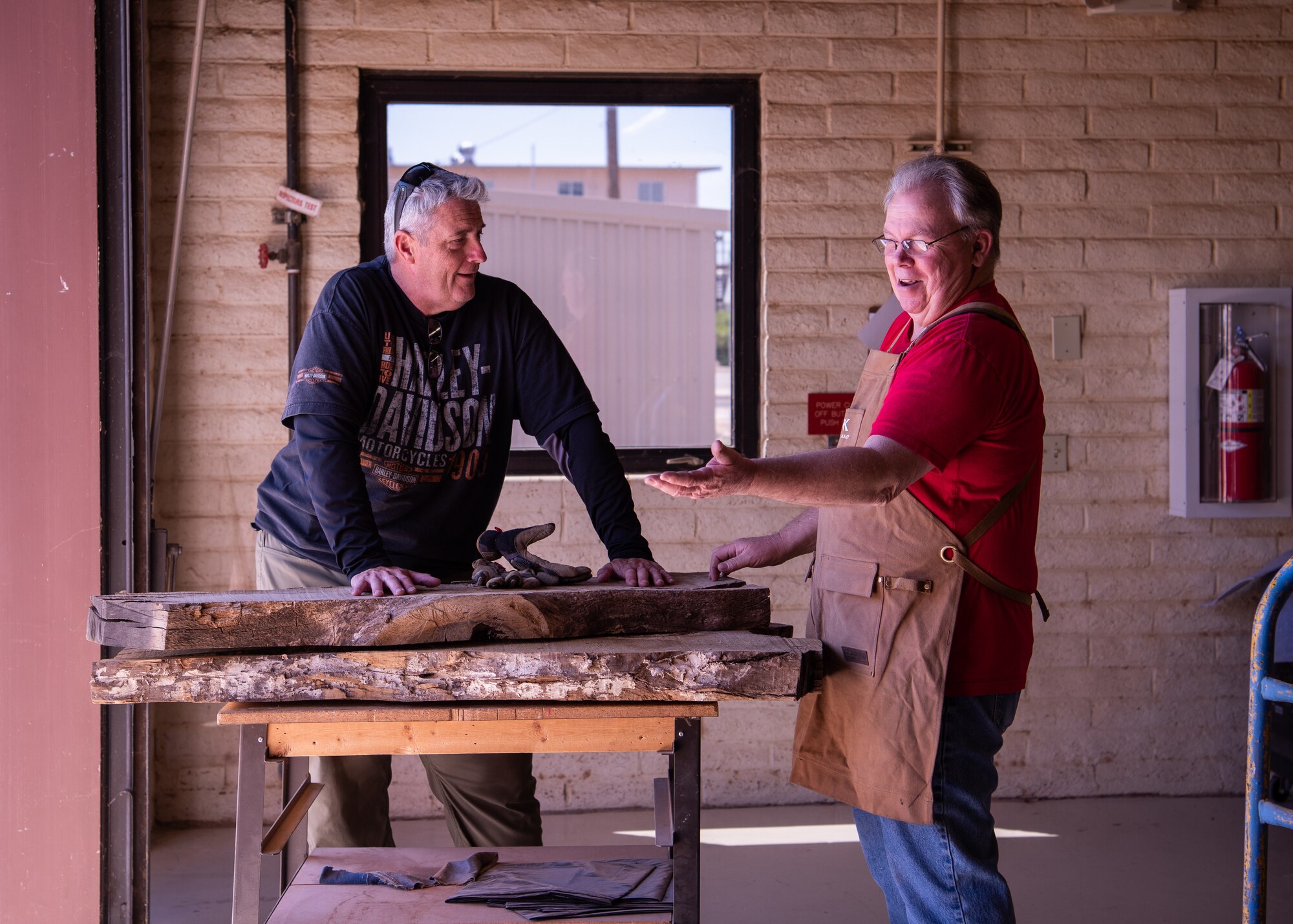 Kirk McCarty, 56th Force Support Squadron wood craft shop manager, discusses options for the type of wood a customer brought in May 4, 2019, at Luke Air Force Base, Ariz.