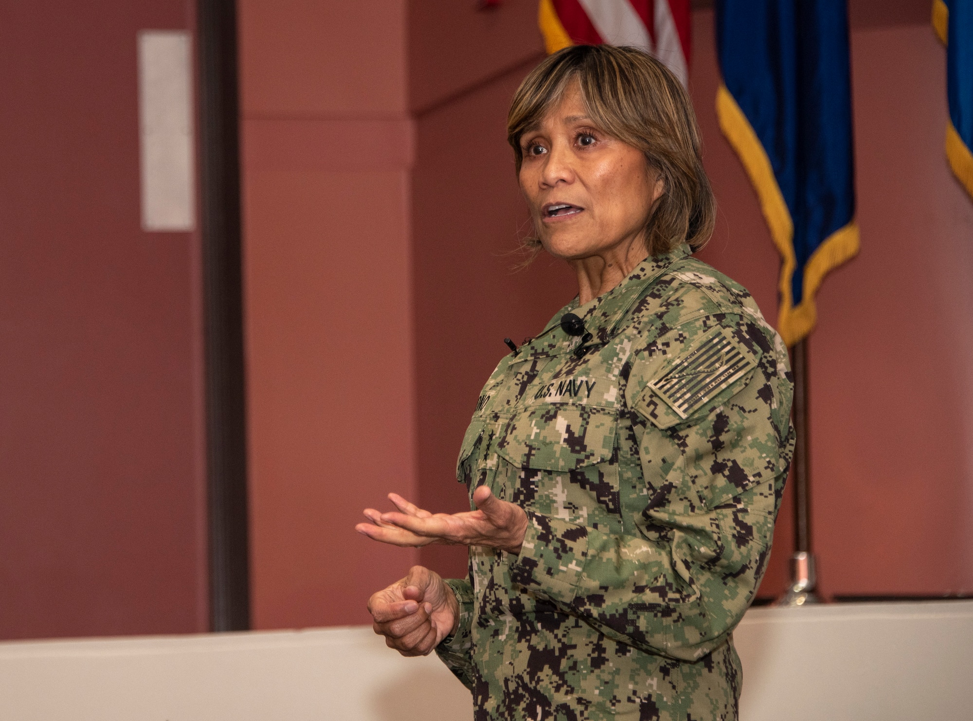 U.S. Navy Vice Adm. Raquel C. Bono, Defense Health Agency, Defense Health Headquarters director, delivers remarks to members of David Grant USAF Medical Center, April 23, 2019, at Travis Air Force Base, California. Bono’s briefing focused on the rollout of the Military Health System GENESIS, the Department of Defense’s new electronic health record, which the 60th Medical Group will use exclusively beginning in September 2019. (U.S. Air Force photo by Heide Couch)