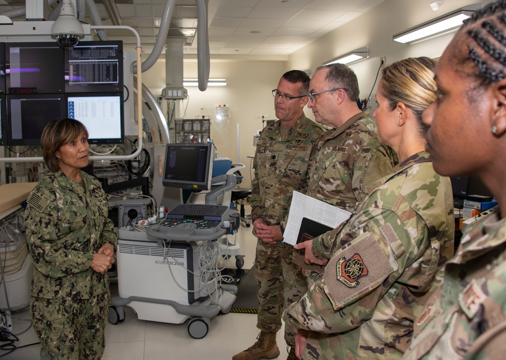 U.S. Navy Vice Adm. Raquel C. Bono, left, Defense Health Agency, Defense Health Headquarters director, tours the heart, lung vascular center at David Grant USAF Medical Center, April 23, 2019, at Travis Air Force Base, California. Bono’s visit focused on the rollout of the Military Health System Genesis, the Department of Defense’s new electronic health record which the 60th Medical Group will use exclusively beginning in September 2019.  (U.S. Air Force photo by Heide Couch)