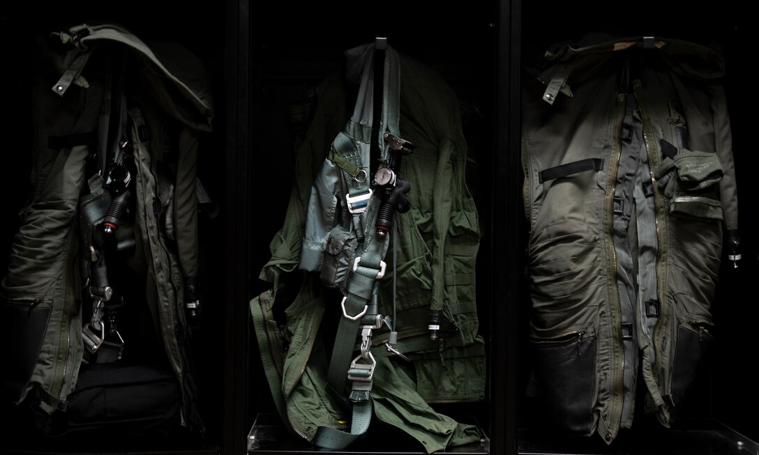 G-suits hang in the 79th Fighter Squadron aircrew flight equipment (AFE) workcenter at Shaw Air Force Base, S.C., May 8, 2019.