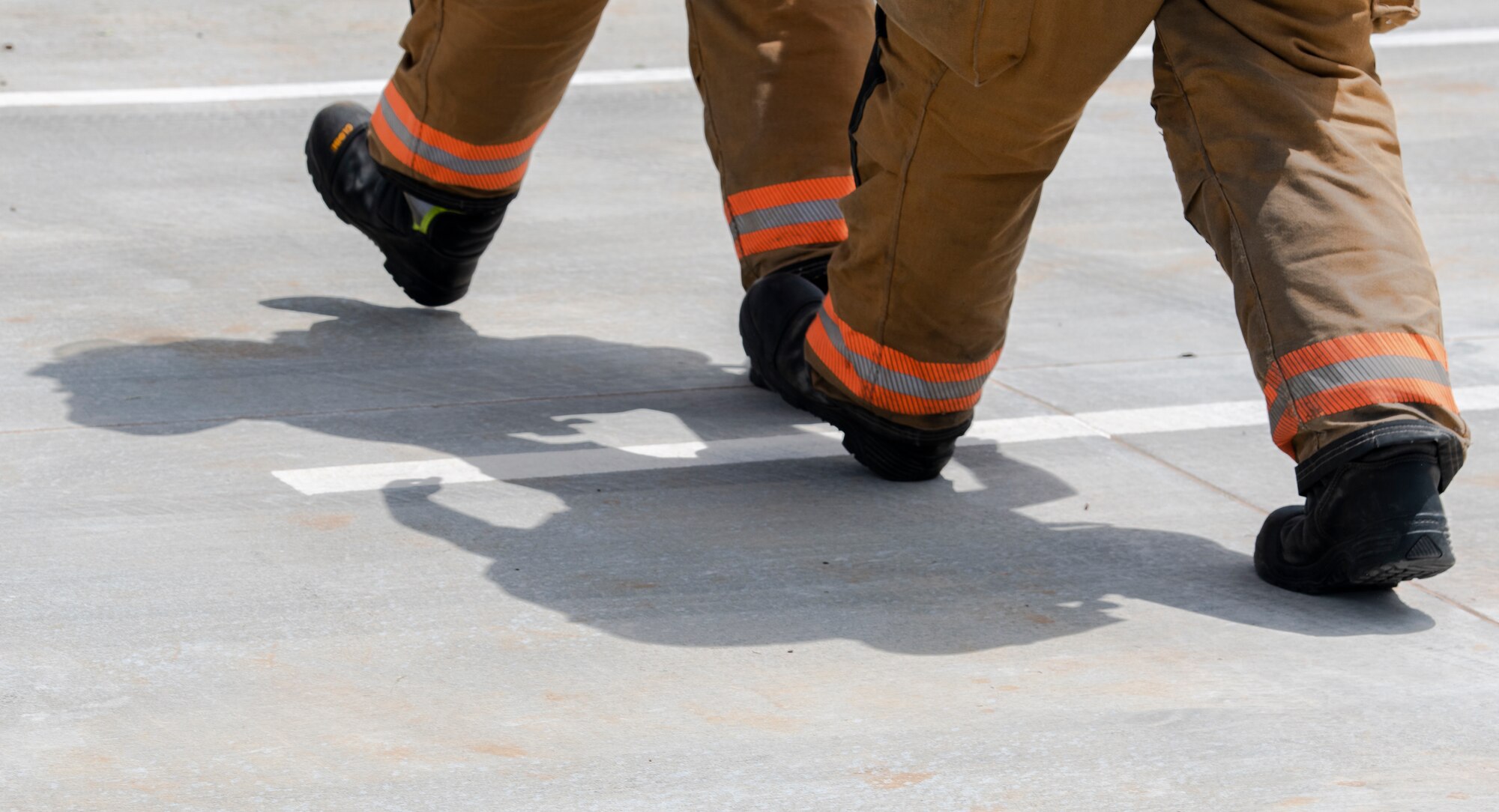 U.S. Airmen assigned to the 20th Civil Engineer Squadron fire department carry a simulated victim during a chemical, biological, radiological and nuclear attack exercise at Shaw Air Force Base, S.C., May 2, 2019.