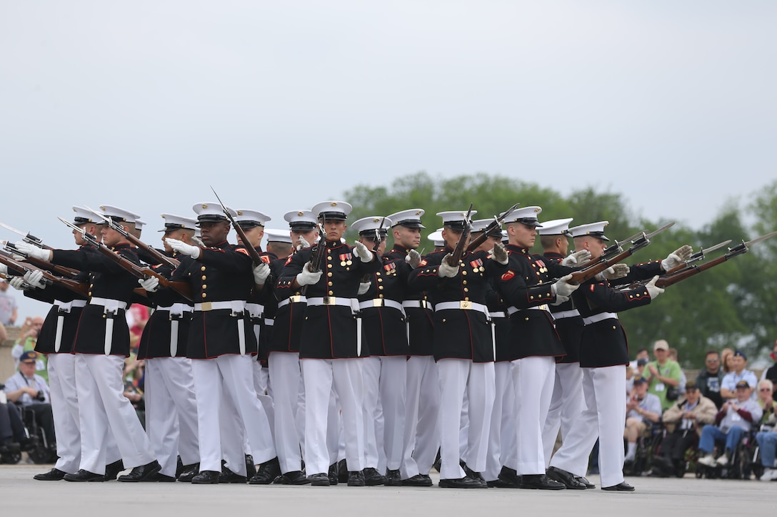 Marines with the U.S. Marine Corps Silent Drill Platoon, Marine Barracks Washington D.C., perform for an Honor Flight at the Lincoln Memorial, Washington, D.C., May 8, 2019. An Honor Flight is conducted by non-profit organizations dedicated to transporting as many United States military veterans as possible to see the memorials in D.C. of the respective war they fought in at no cost to the veterans. (U.S. Marine Corps photo by Pfc. Allen Sanders)