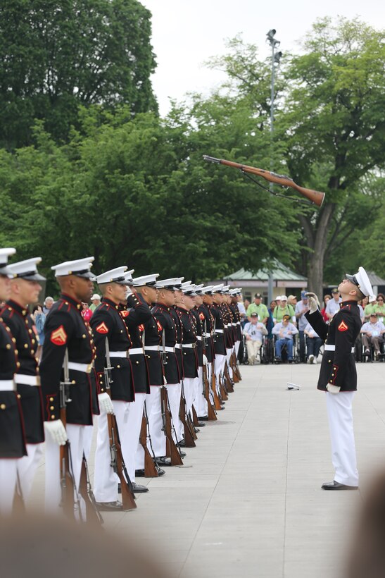 Marines with the U.S. Marine Corps Silent Drill Platoon, Marine Barracks Washington D.C., perform for an Honor Flight at the Lincoln Memorial, Washington, D.C., May 8, 2019. An Honor Flight is conducted by non-profit organizations dedicated to transporting as many United States military veterans as possible to see the memorials in D.C. of the respective war they fought in at no cost to the veterans. (U.S. Marine Corps photo by Pfc. Allen Sanders)