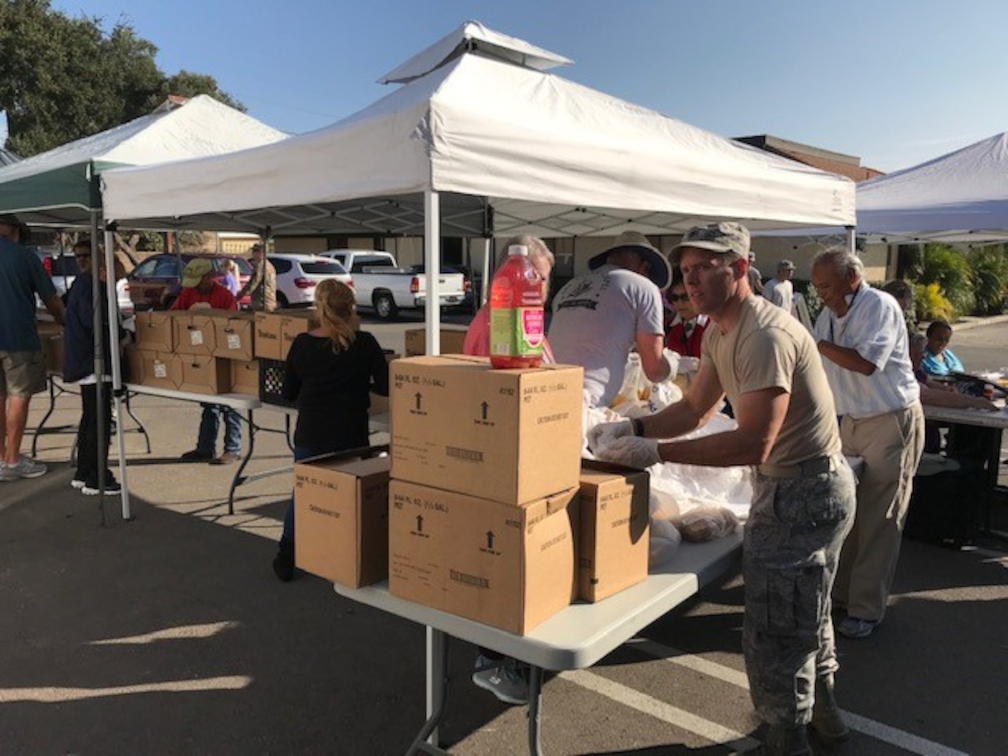 Volunteers sort food during an event with the Village Chapel Food Bank Nov. 16, 2018, at Vandenberg Village, Calif.