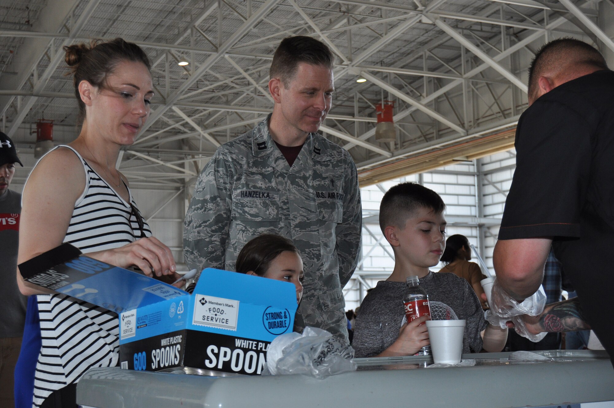 Chaplain (Capt.) Matthew Hanzelka, 433rd Airlift Wing, takes a moment to get some ice cream during the 433rd AW family day May 5, 2019 at Joint Base San Antonio-Lackland, Texas.